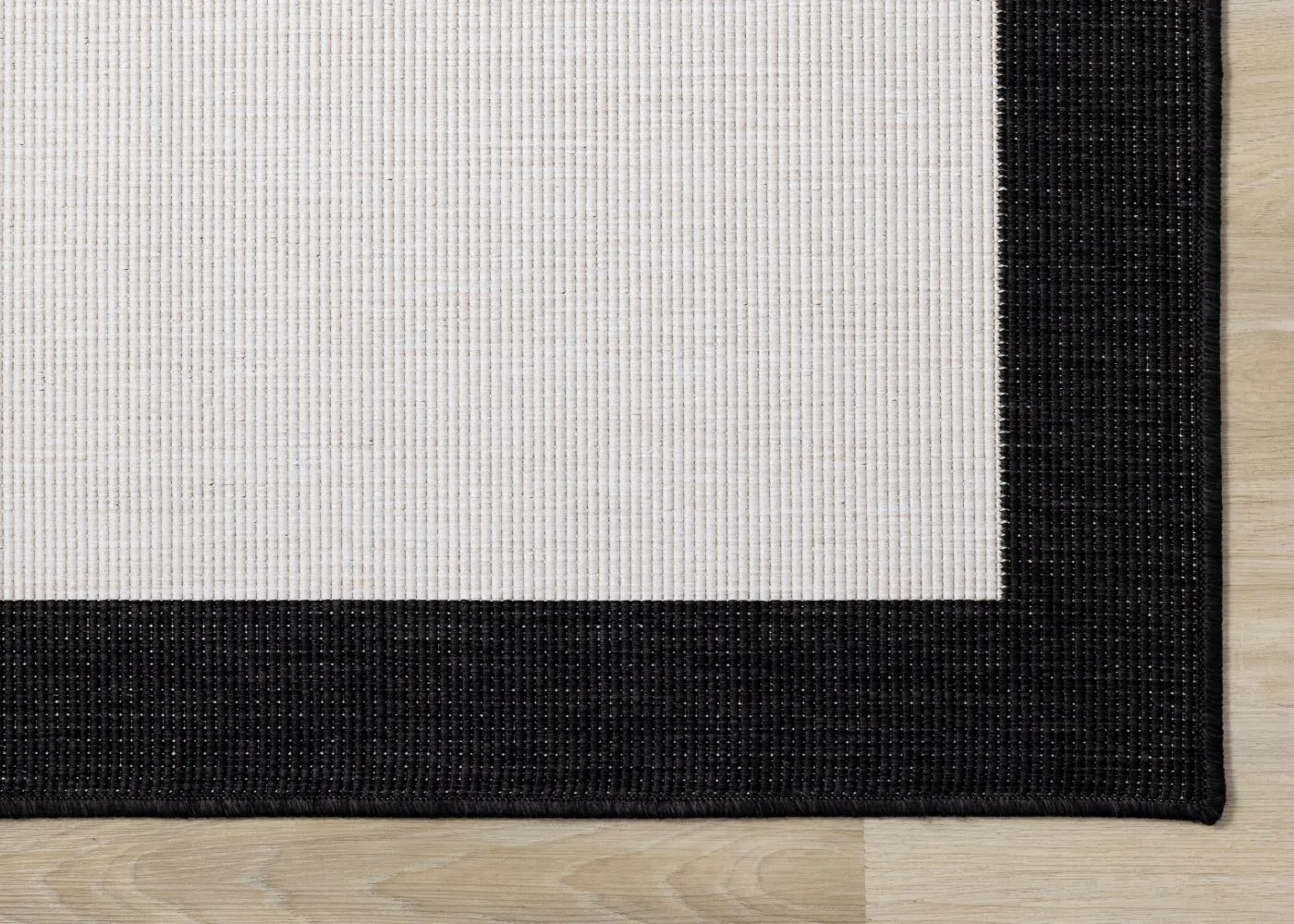 Summer Breeze 6'7" x 9'6" Reversible Outdoor Rug - Cream, Black Border